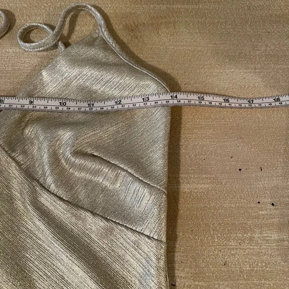 Fashion Nova metallic gold bodycon dress with tulip flap detail in front. - Picture 5 of 11